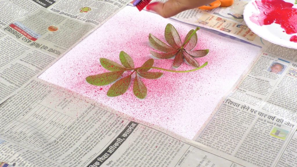 leaf painting on newspaper